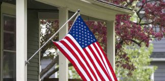 Dad, 72, FOUGHT BACK — Police Just Decided His FATE American flag hanging from a house porch
