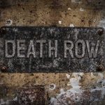 Chilling Warning IGNORED Inside Death Chamber Rusty metal sign on worn concrete wall