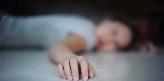 Ax Horror Shocks LA Court Hand of a person lying on the floor